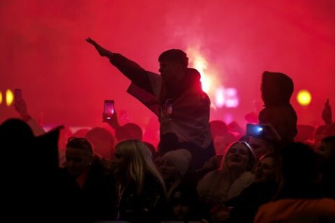 A Croatian handball supporter raises his arm during the team's welcome home ceremony IN the main square of Zagreb late February 2, 2026, after they became bronze medalists at the 2026 European Handball Championships. A controversial ultra-nationalist Croatian singer welcomed the country's medal-winning handball team back to Zagreb with a gig attended by thousands after the mayor's attempts to block the event failed. Folk-rock icon Marko Perkovic, whose stage name is Thompson, is famous for a song that starts with the salute of Croatia's World War II pro-Nazi Ustasha regime, and his fans often display fascist symbols,Image: 1071727046, License: Rights-managed, Restrictions: , Model Release: no, Credit line: MARKO PERKOV / AFP / Profimedia